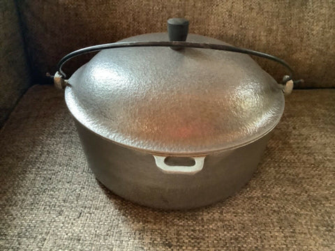 Magnalite 8 quart pot w/lid, broiling pan, steam table pan, lid and trays.  - Northern Kentucky Auction, LLC