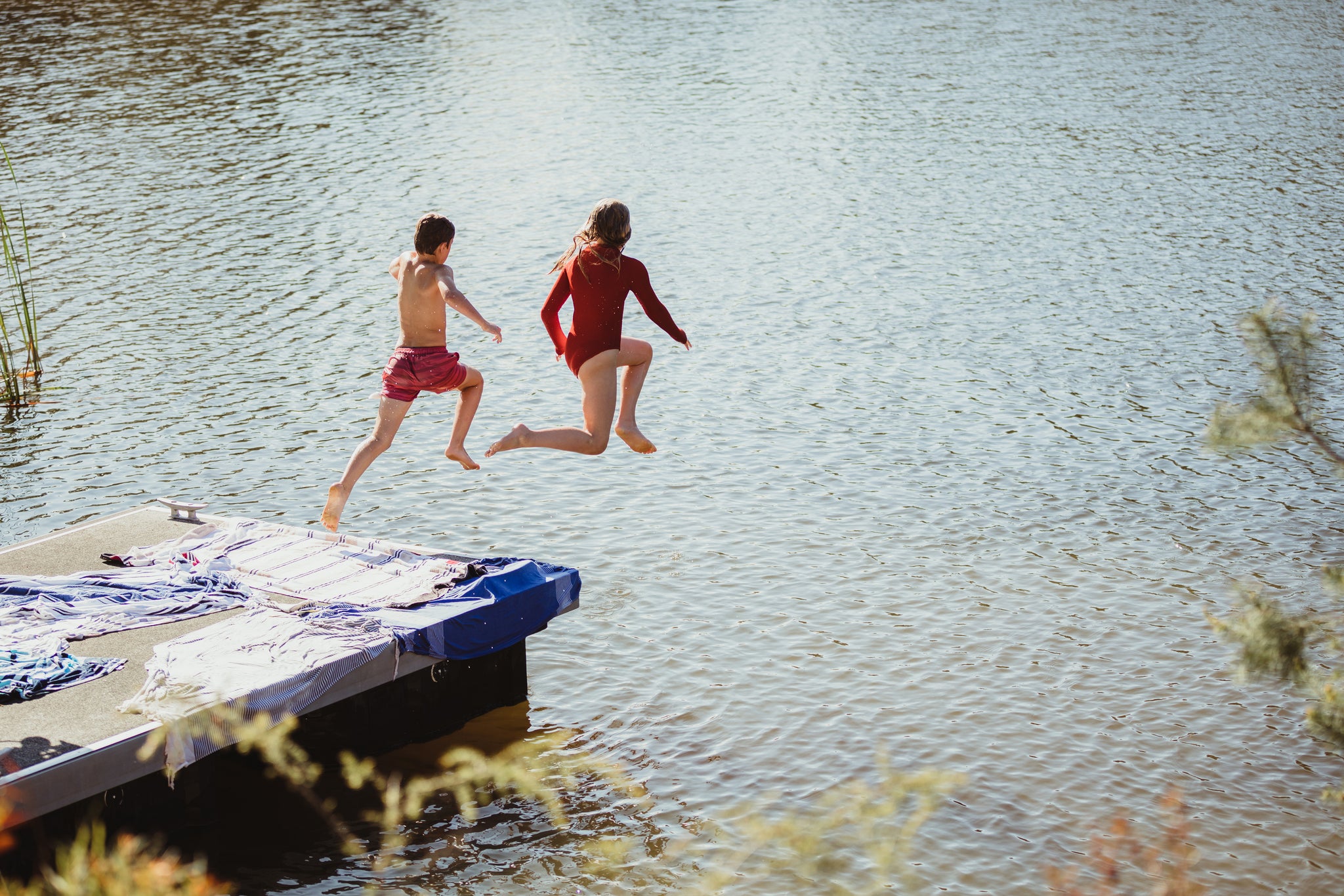 Kids Jumping into Lake Palinopsia Designing Lifestyle