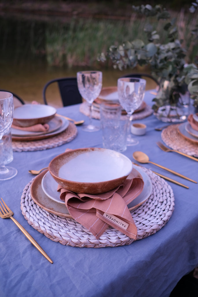 Handmade 3 piece dinner set on outdoor summer table in brown and rustic vintage inspired colours by Palinopsia Ceramics