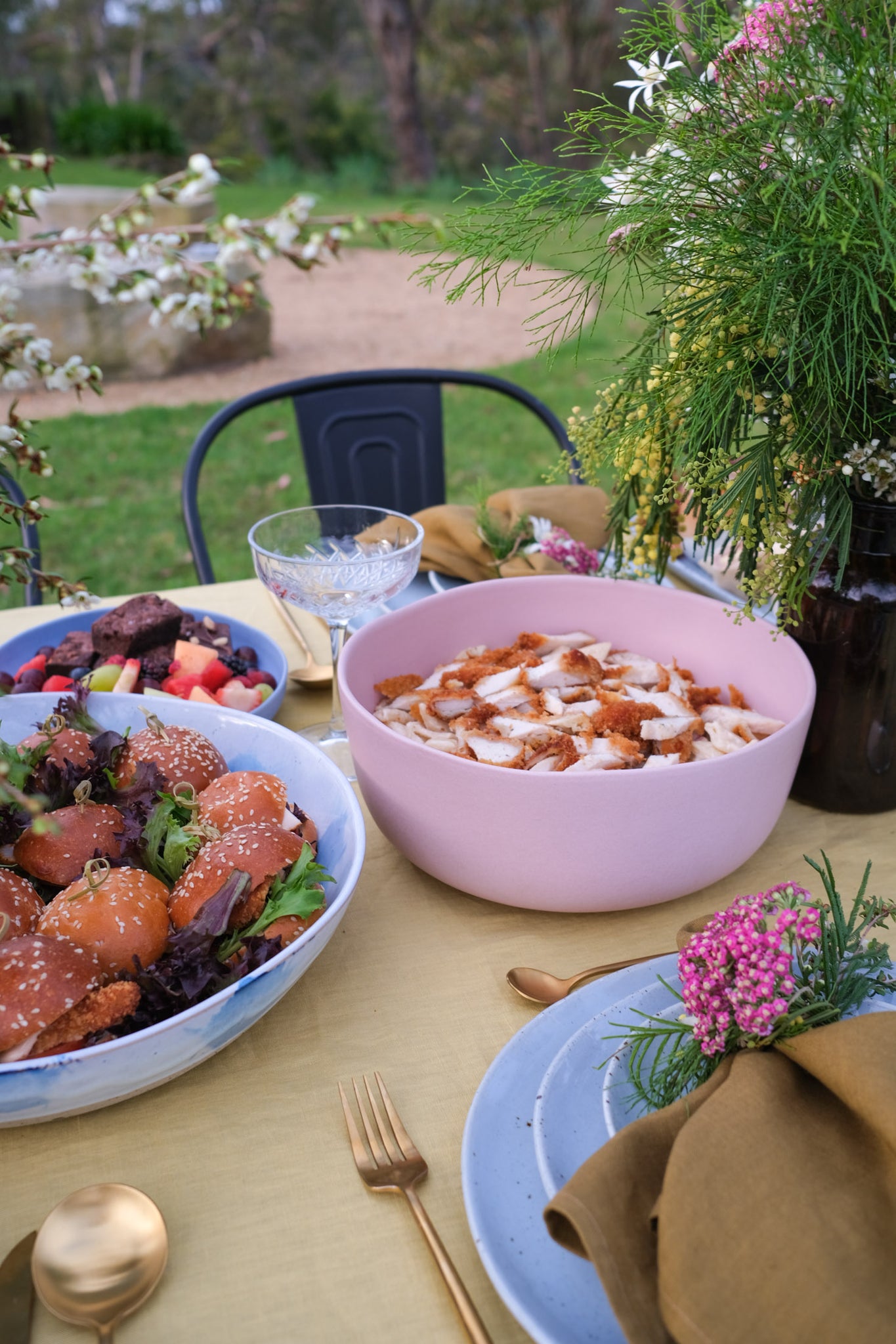 Soul Origin Catering Summer Salads with handmade ceramics by Palinopsia Ceramics on outdoor table setting in Australia