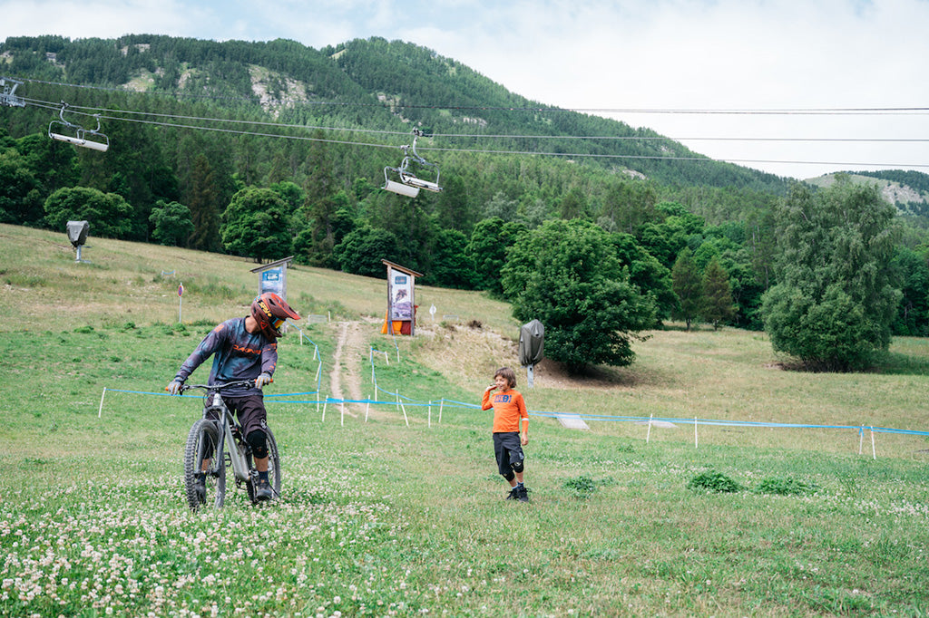 father and son at mountain bike park in france