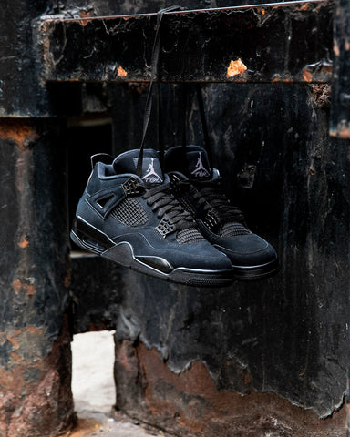 black jordans retro 4 black cat