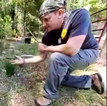 Joe Flowers shows how to use a machete while holding a grabat