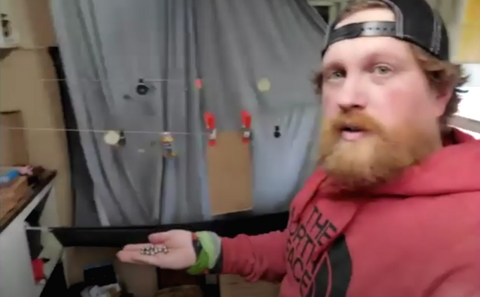 Zachary Fowler holding slingshot ammo