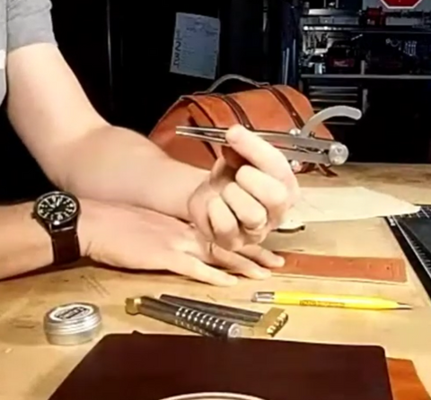 Jeb Harber shows a stitch groover for leatherworking