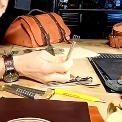 Jeb Harber shows a stitching chisel for leatherworking