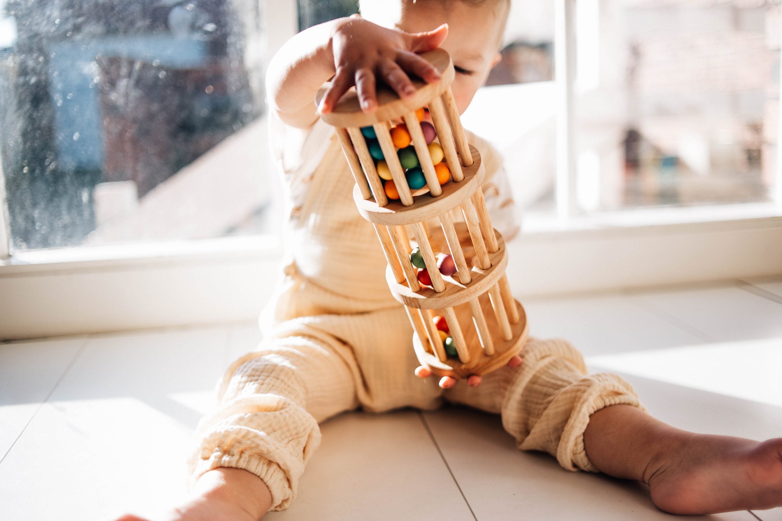 wooden rainmaker toy