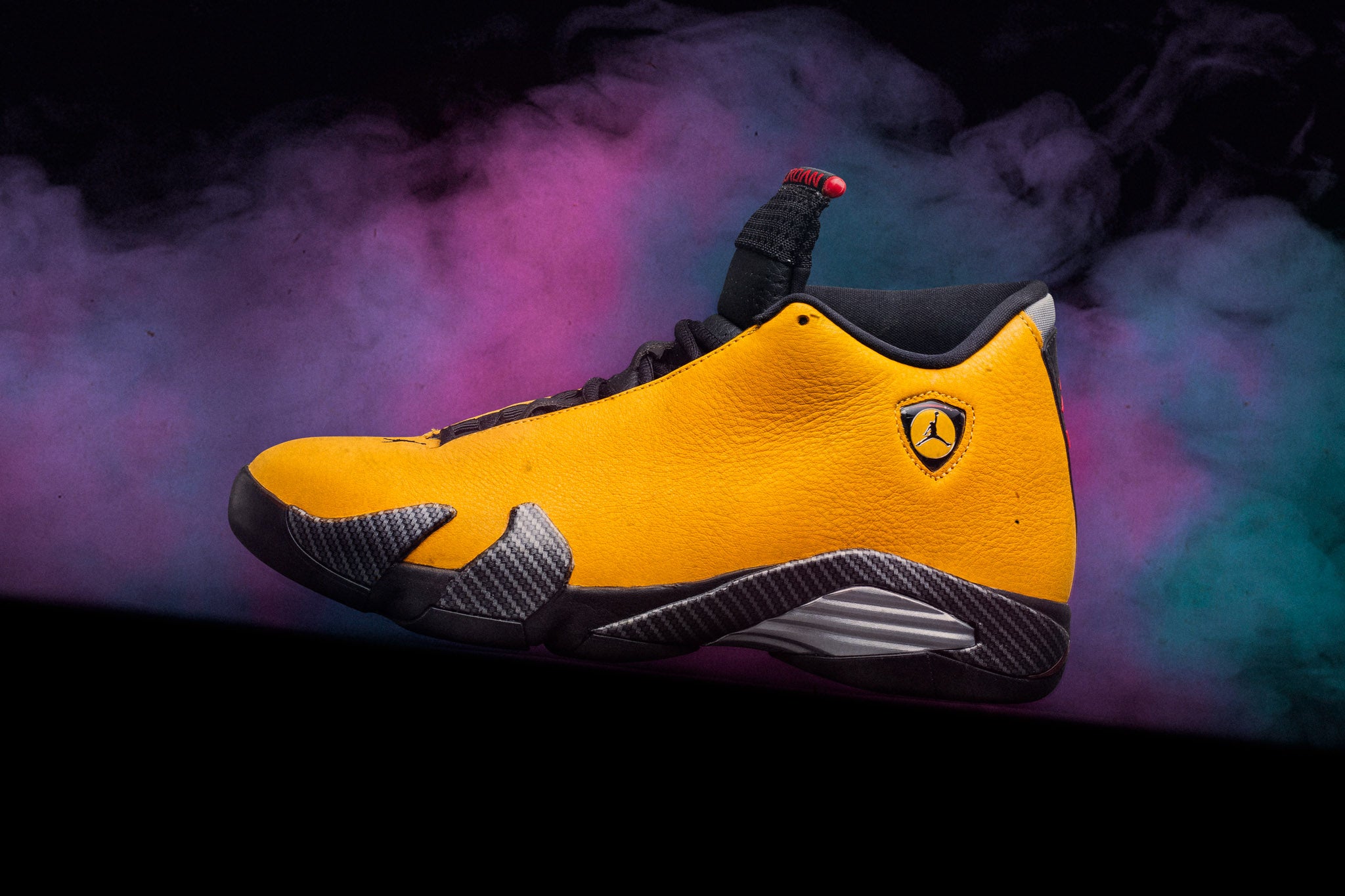 jordan 14 yellow and purple