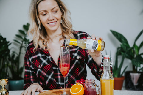 Wild Life Botanicals ultra low alcohol sparkling wine, Festive Mimosa, healthy mindful cocktail recipe.