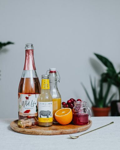 Wild Life Botanicals low alcohol sparkling wine, low-calorie cocktail, low-alcohol mindful cocktail, Festive Mimosa.
