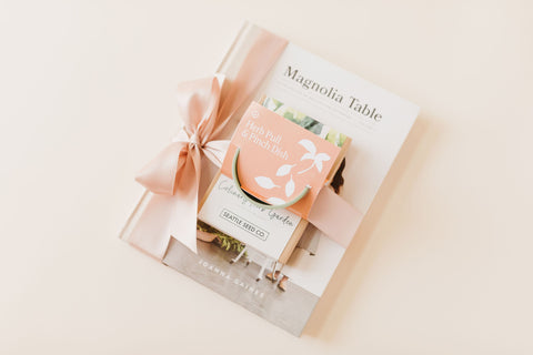 Magnolia Table cookbook, herb pull and pinch dish, garden seeds wrapped with a pink ribbon