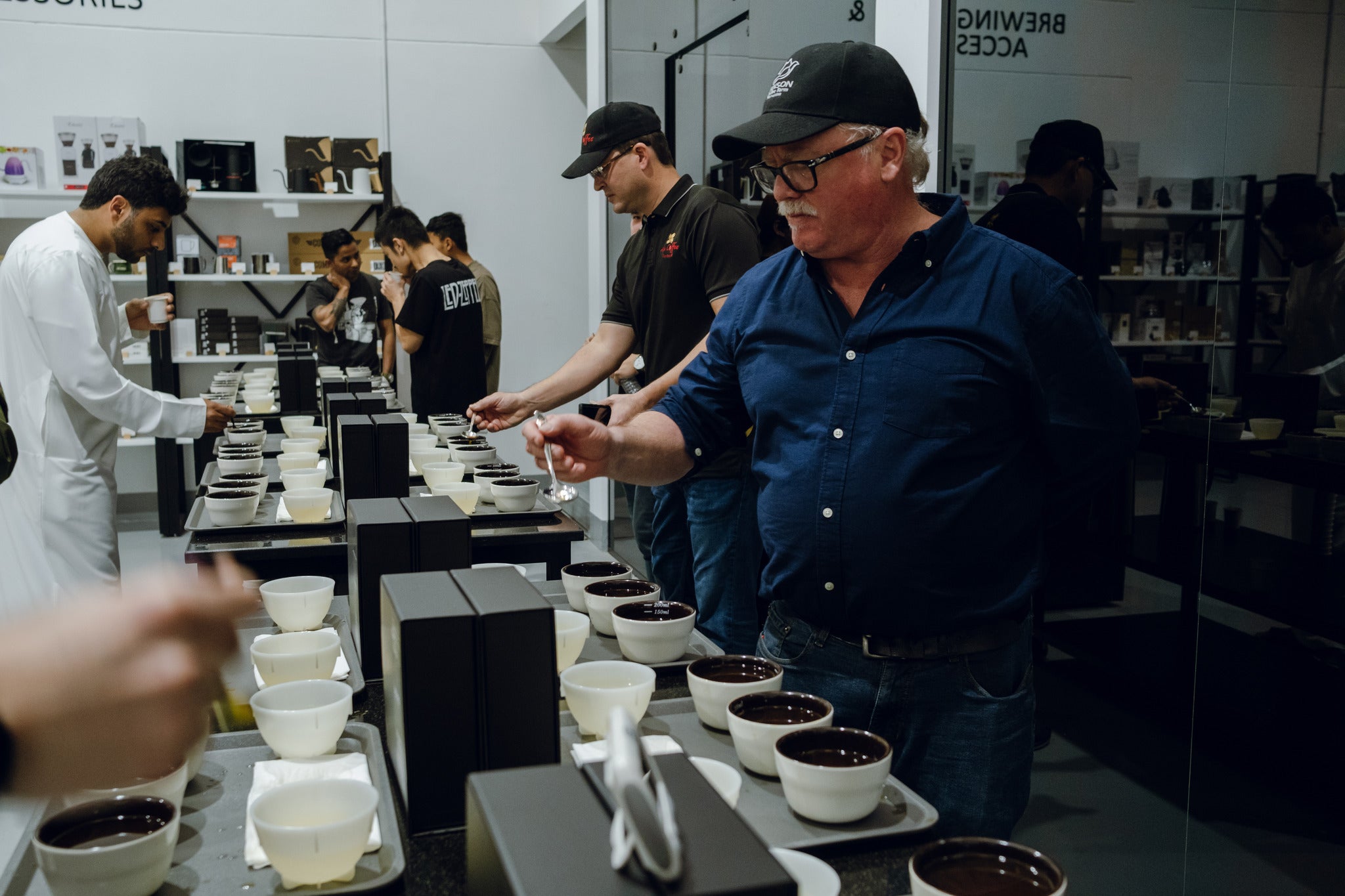 Kai cupping Janson Coffee for Archers Producers Talk