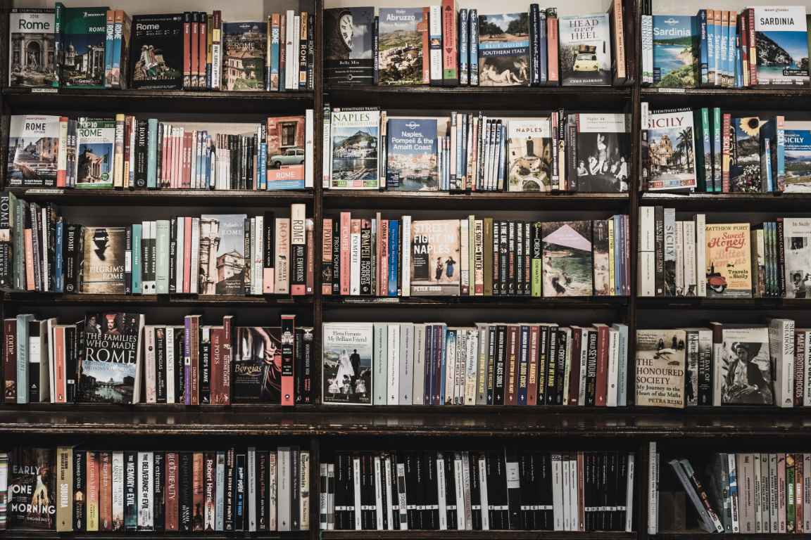 Photo of bookshelves at Daunt Books, London. Photo by Ugur Akdemir.