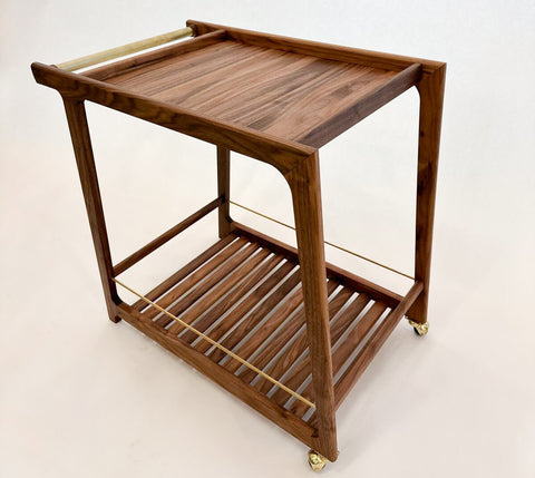 A bar cart made from walnut finished with Rubio Monocoat hardwax oil wood finish.