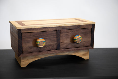 Keepsake box made from walnut, white oak and skateboard wood.
