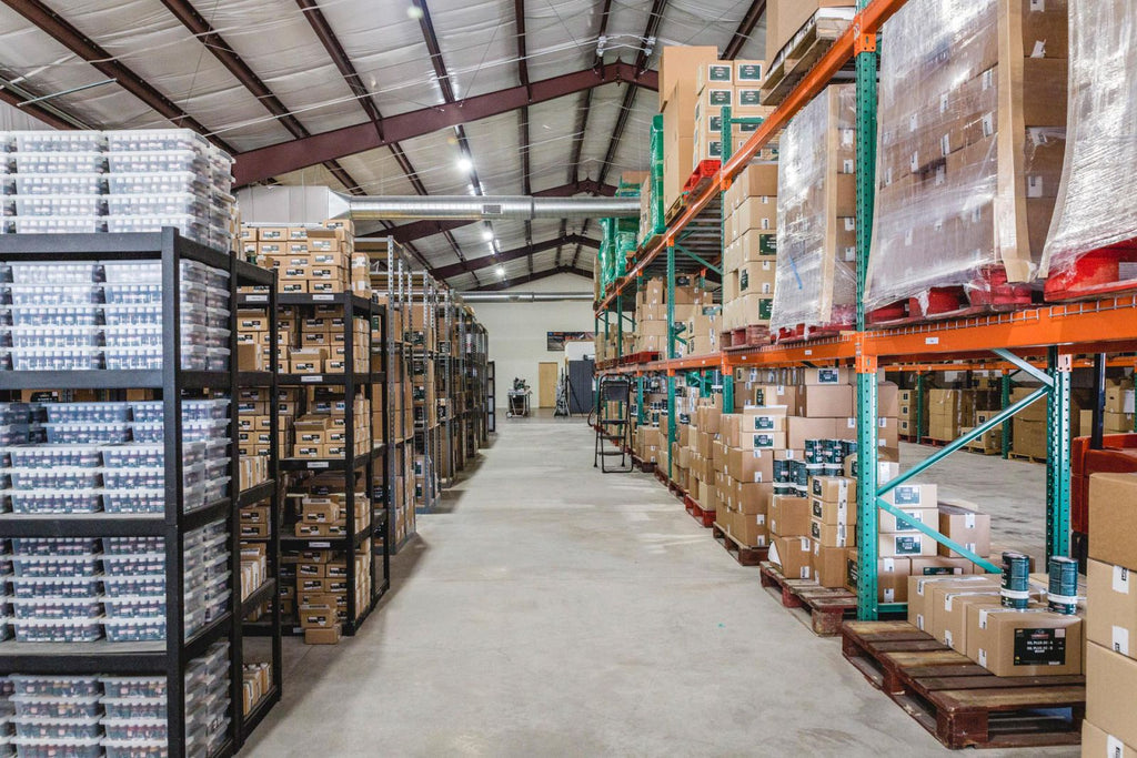 Warehouse with stocked racks and shelves