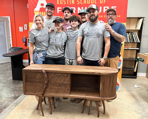 Team Lighthouse Woodworks poses with their build.