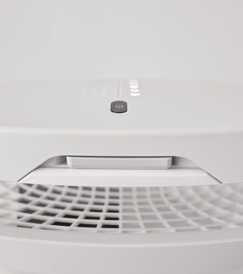 BioGS 2.0 air purifier top view, with remote control in the slot.