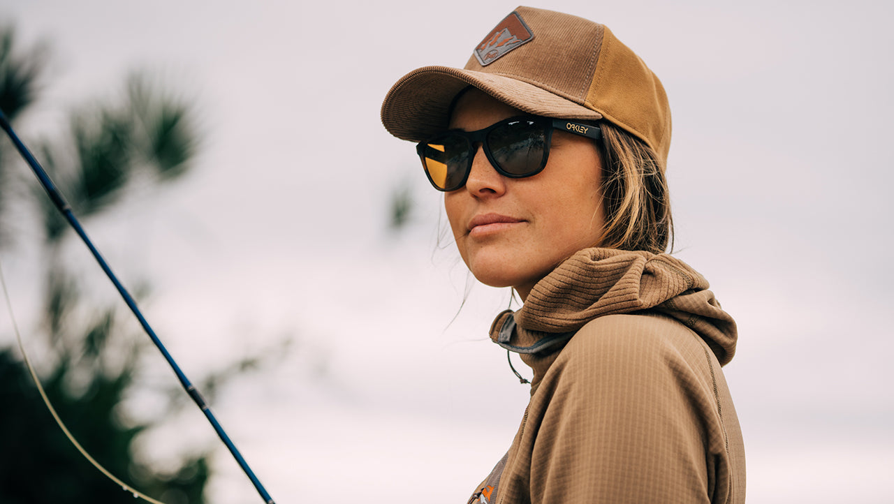 Maddie Brenneman fishing in Revant Elite Polarized Dark Brown lenses