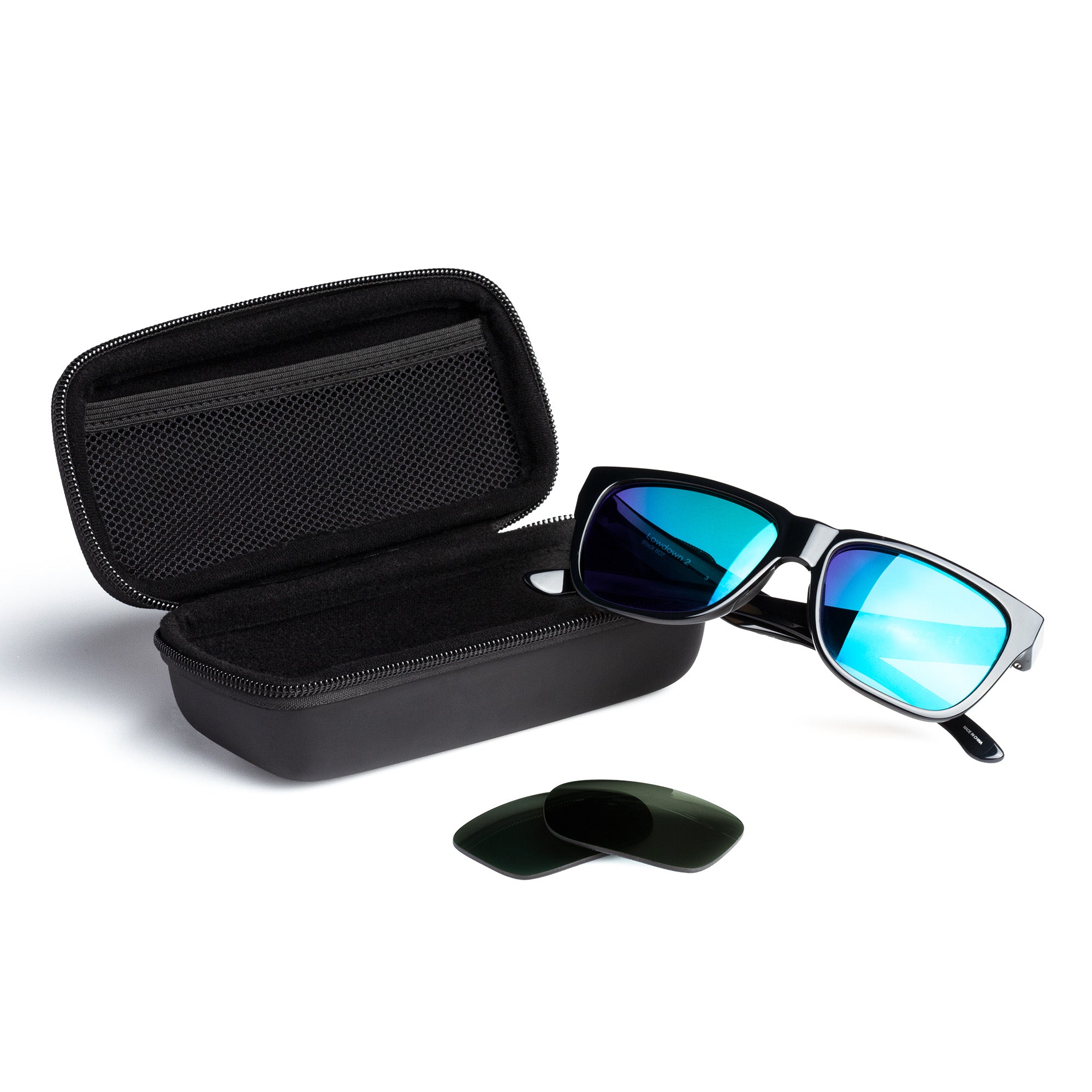 revant keeper lite sunglass case open with sunglasses and a pair of lenses around it