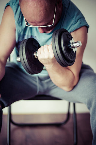 Man with dumbbell exercising