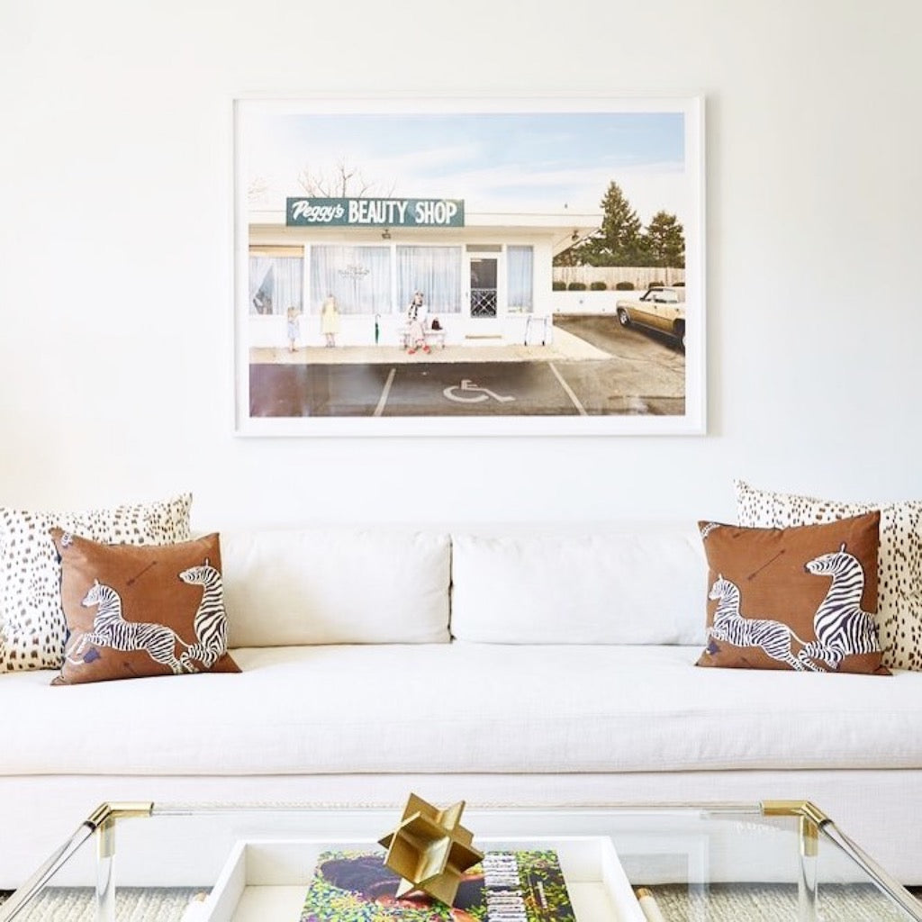 art by julie Blackmon in a space designed by Ariel Okin