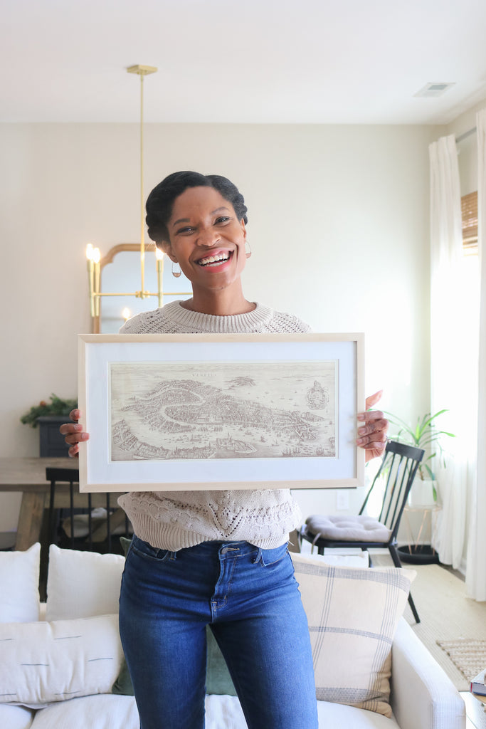 Tiffany of pretty real with her custom framed map