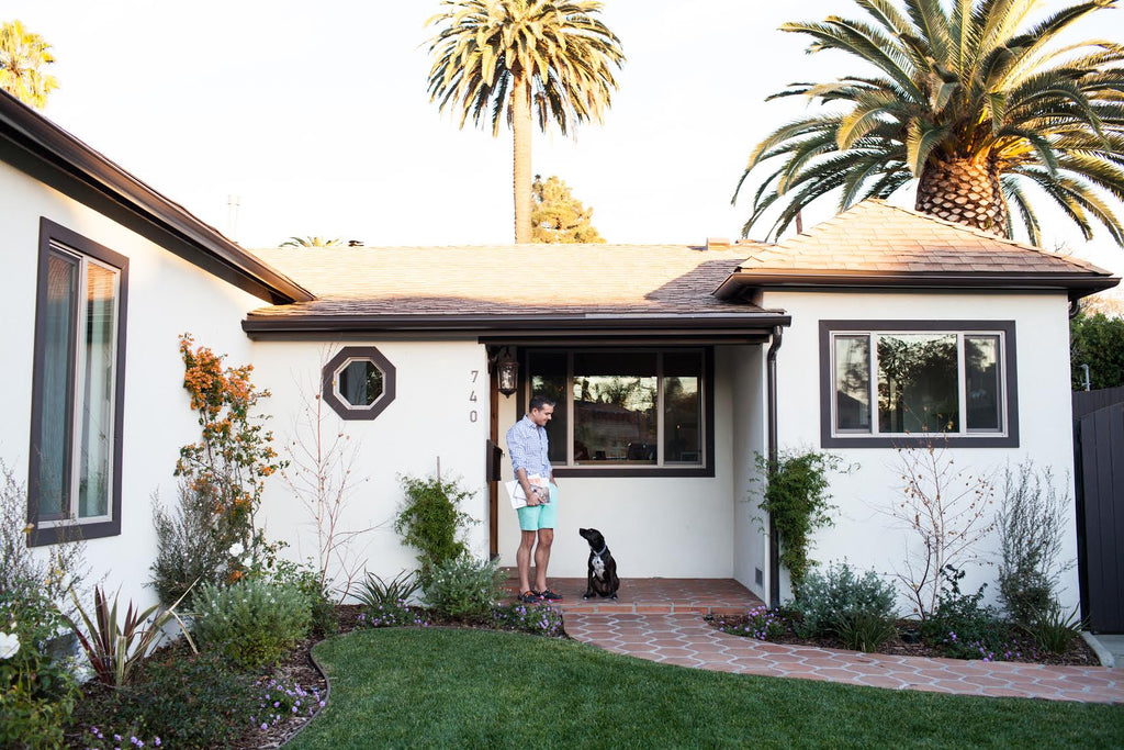 Gray Malin at home with his dog Stella via Simply Framed 