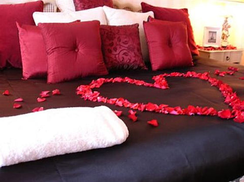 satin bed with roses for Valentine's day