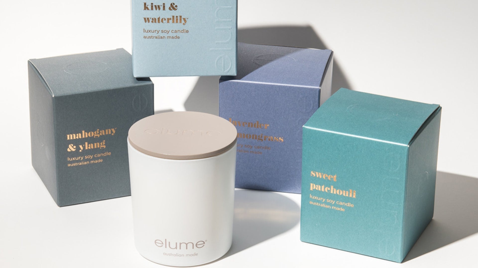 Elume jar candles in winter fragrance colours