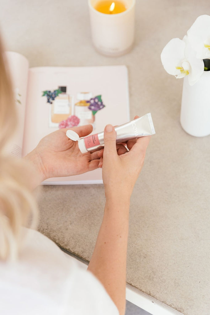 woman applying hand cream Ecoya