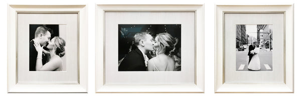 Trio of black and white wedding photos in sophisticated light gray silk mat and white frame.