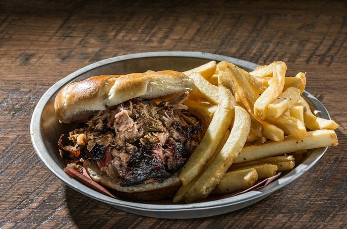 Pulled pork sandwich with fries