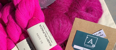Pink garn fra bc garn med gavekort til almaknit på en strikkeopskrift