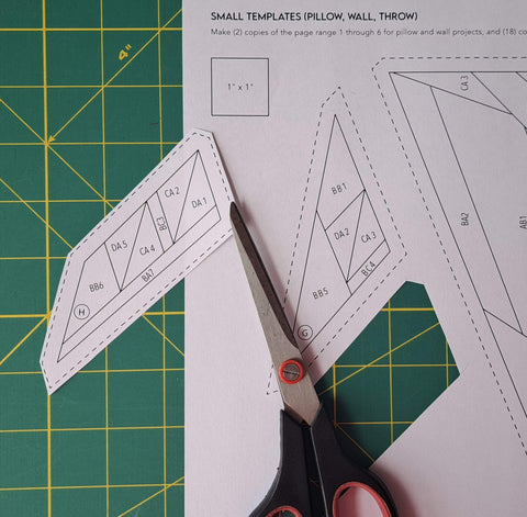 cut out templates with 1/8" excess paper