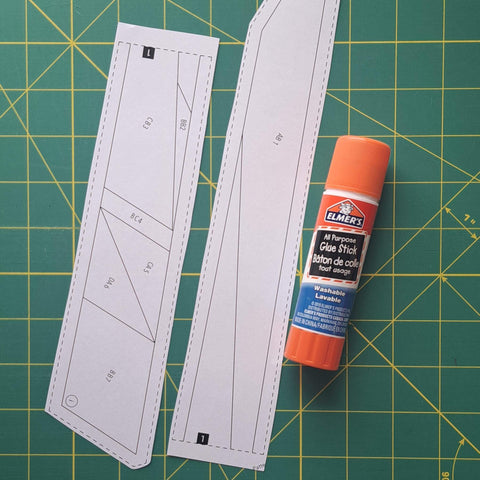 Two pieces of a template that need to be glued together.