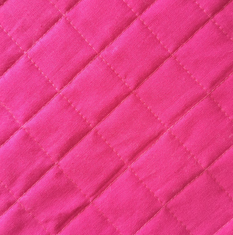 fabric quilted in a square cross hatch