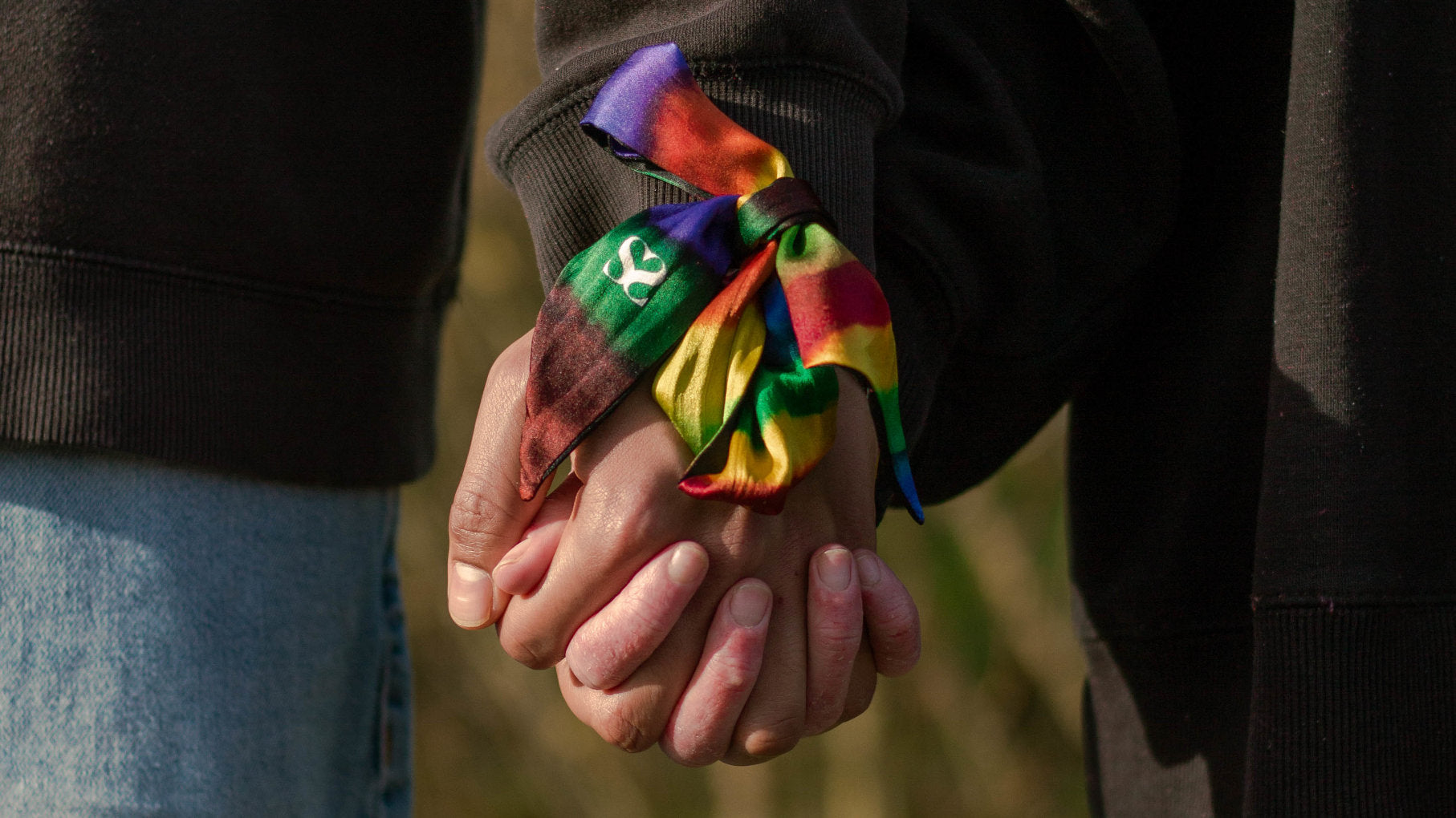 Hand holding with scarf