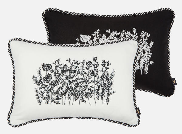 Black and white embroidered cushions