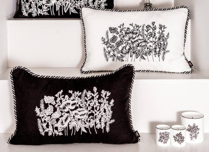 Embroidered linen cushions in black and white