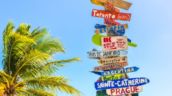 Signpost showing directions to major cities