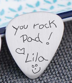 Child’s actual handwriting engraved on a guitar pick. “You rock Dad!”