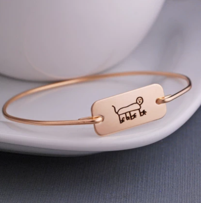 Engraved child’s artwork bracelet in 14K gold