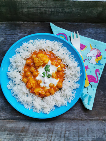 Child's portion of quick chickpea curry with cauliflower, basmati rice, greek yogurt and fresh coriander