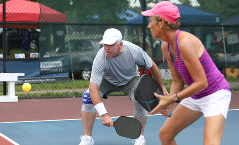 Couple playing Pickle Ball