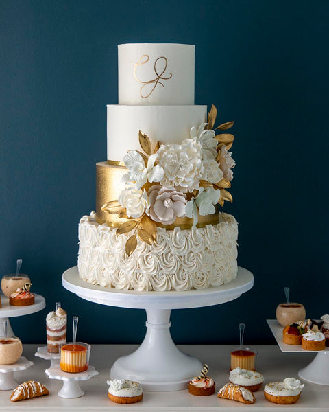 Elegant wedding cake with gold and burgundy colors on Craiyon