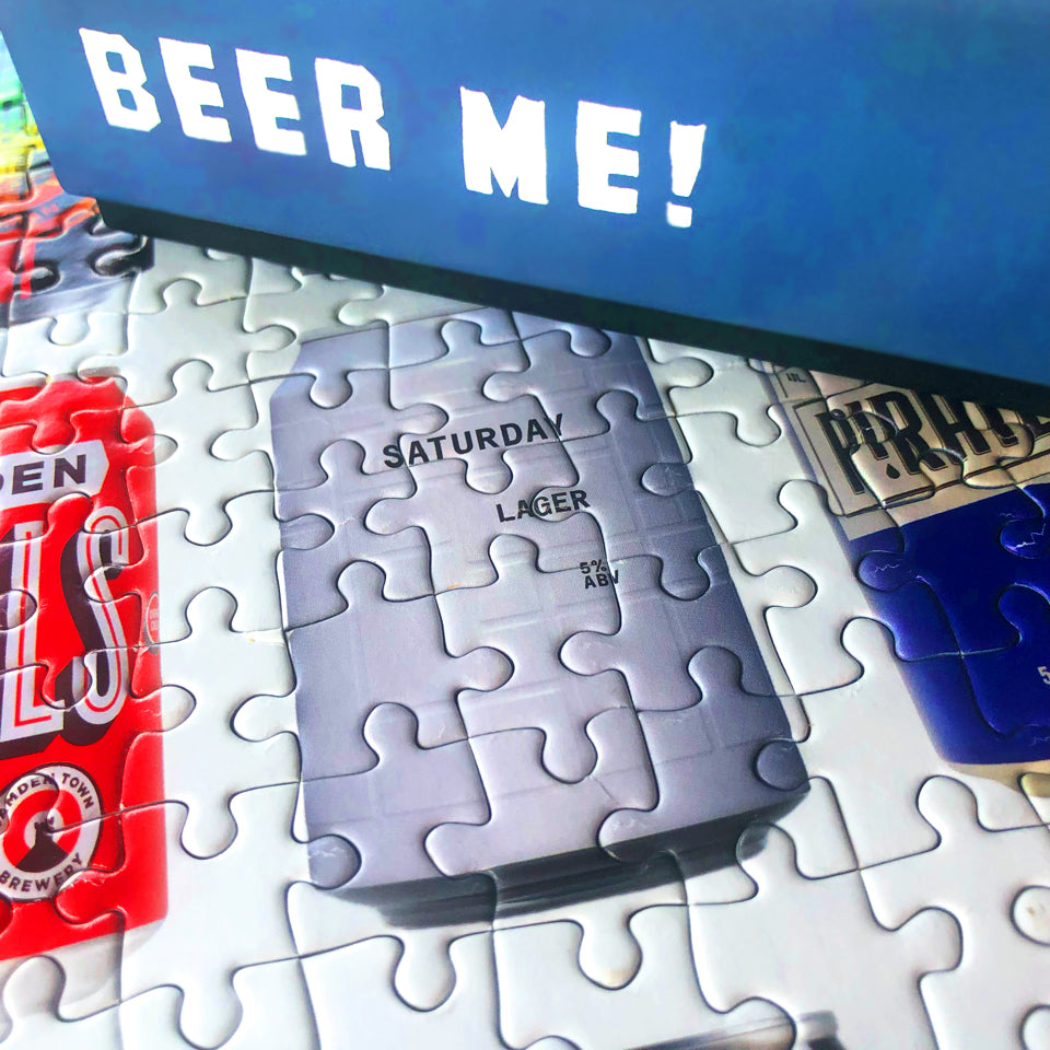 An AND UNION SATURDAY Lager craft beer in a puzzle