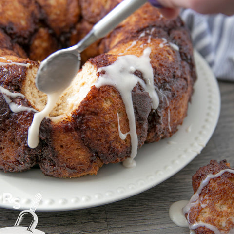 sugar icing drizzle on cinnamon gluten free monkey bread from Rustic Scoop