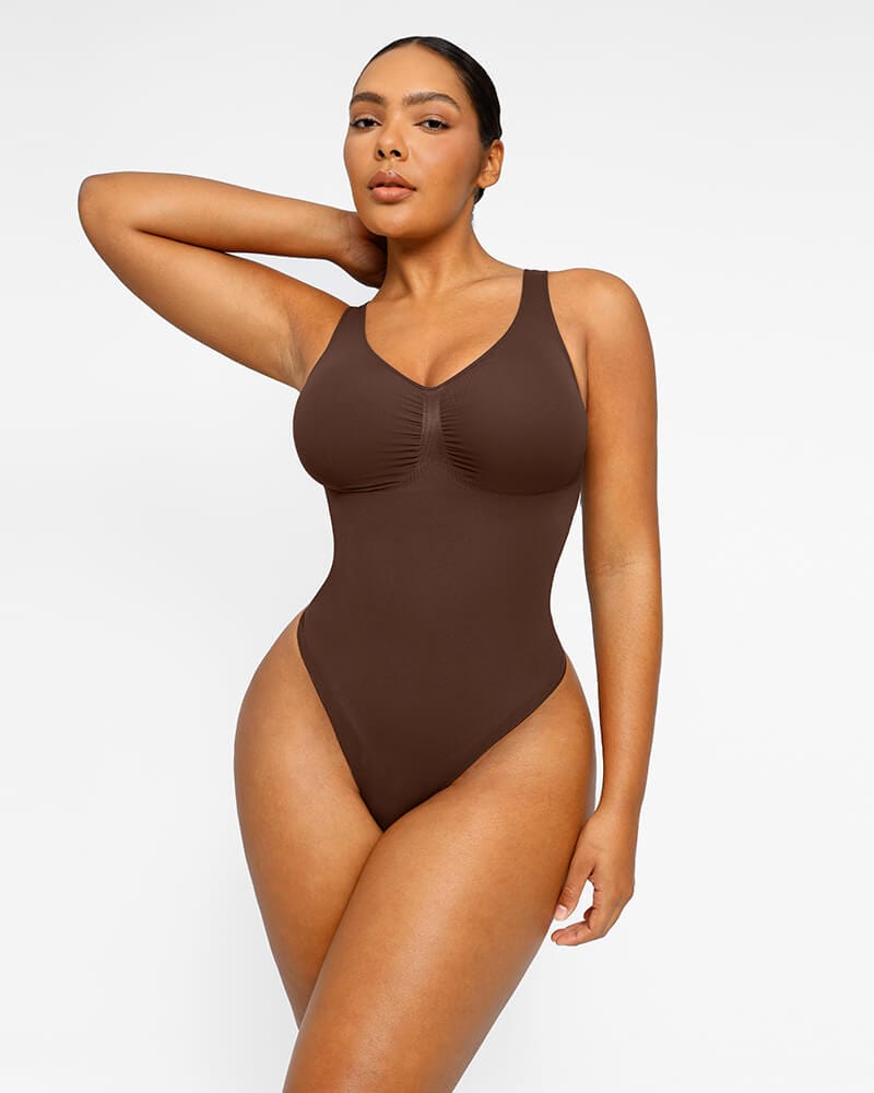 https://cdn.shopify.com/s/files/1/0261/7058/9218/files/PowerConceal_2.0V-NeckThongBodysuit_8.jpg?v=1708283056