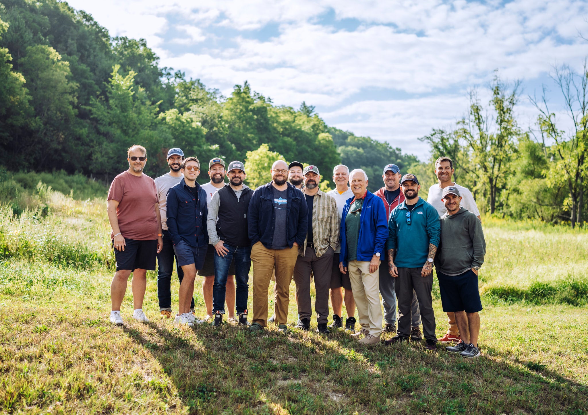 Image of a group of guys in front of a field in Wisconsin